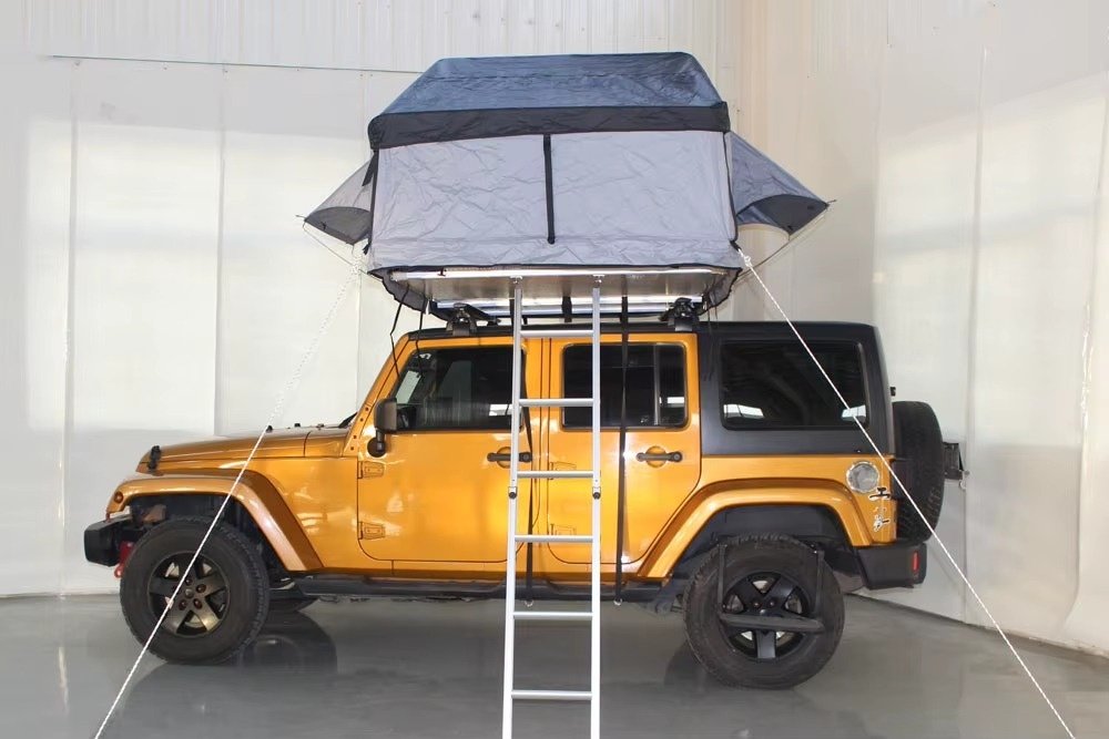 Rear view of SRT01E-76 soft shell rooftop tent on 4x4 vehicle