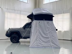 Rear view of rooftop tent with annex room on 4WD vehicle