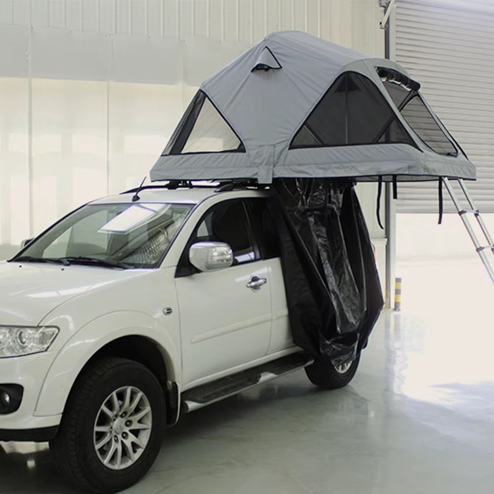 4x4 vehicle with SRT13S-56 rooftop camping tent and aluminum ladder