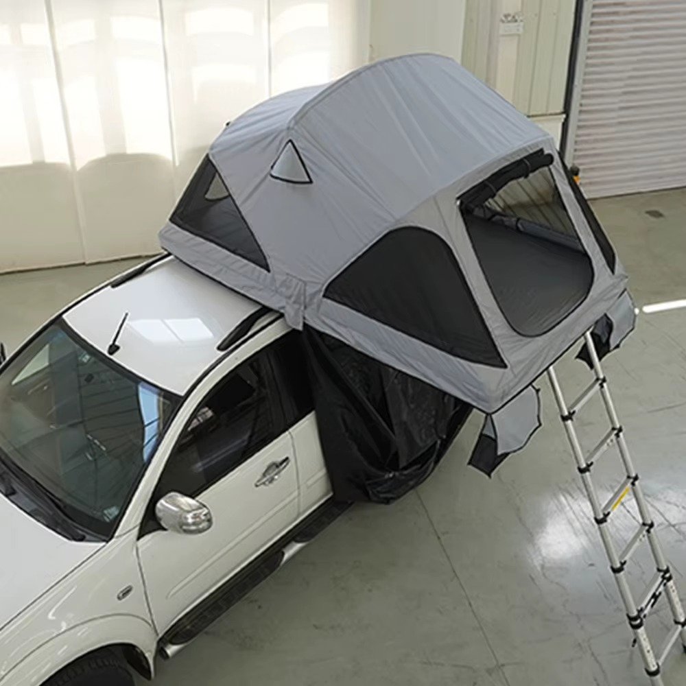 Interior of SRT13S-56 rooftop camping tent with mesh ventilation panels
