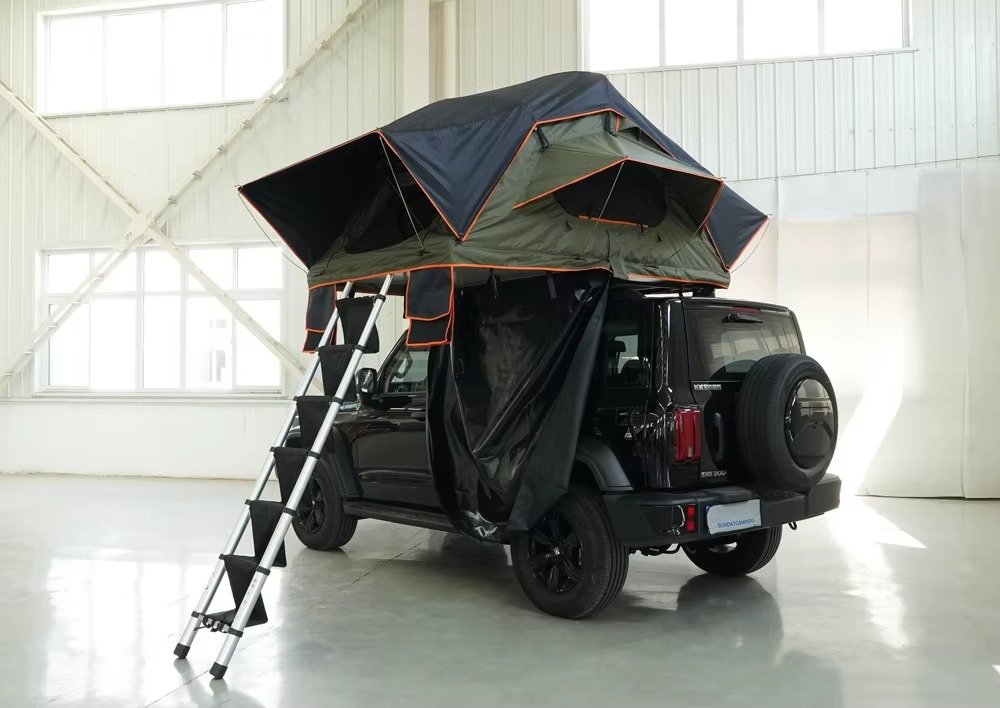 Rooftop camping tent installed on SUV for off-road travel