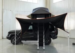 SUV rooftop tent with large extended outdoor awning
