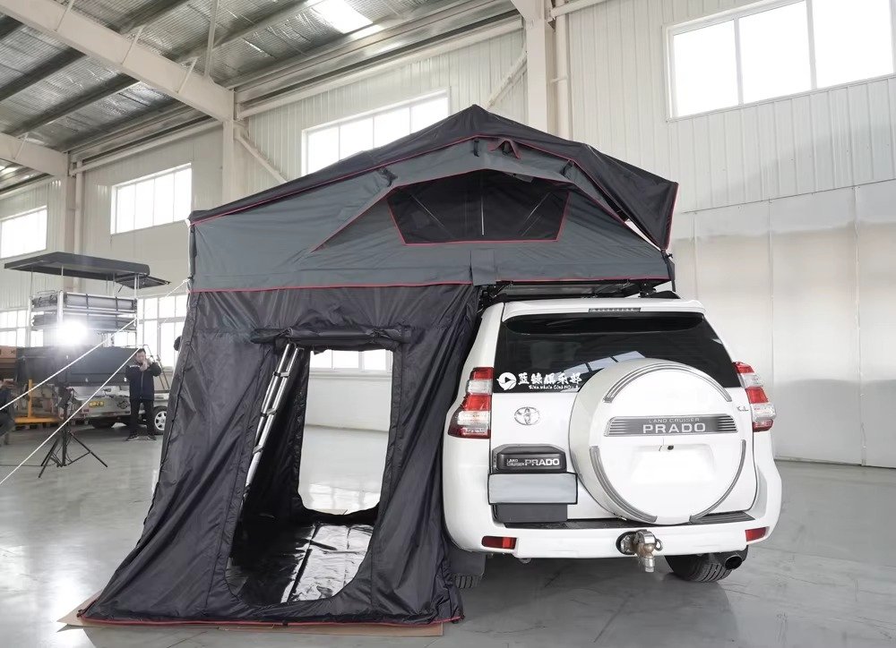 SUV tailgate camping tent showing the side entrance and enclosed outdoor shelter