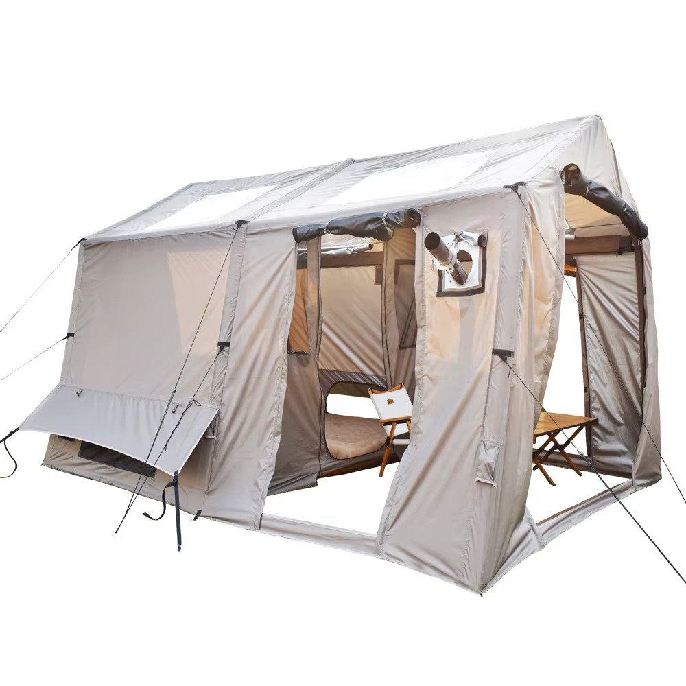Light gray camping tent with an open porch, visible interior, side windows, and a stove pipe port.