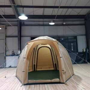 Beige inflatable camping tent displayed with the front entrance open on a wooden deck.