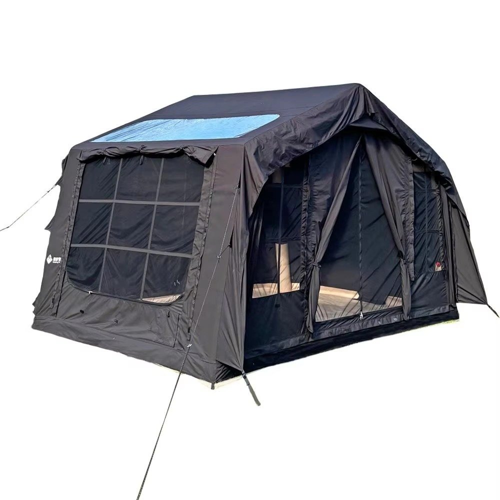 Black cabin-style inflatable camping tent with a blue roof skylight panel on a white background.
