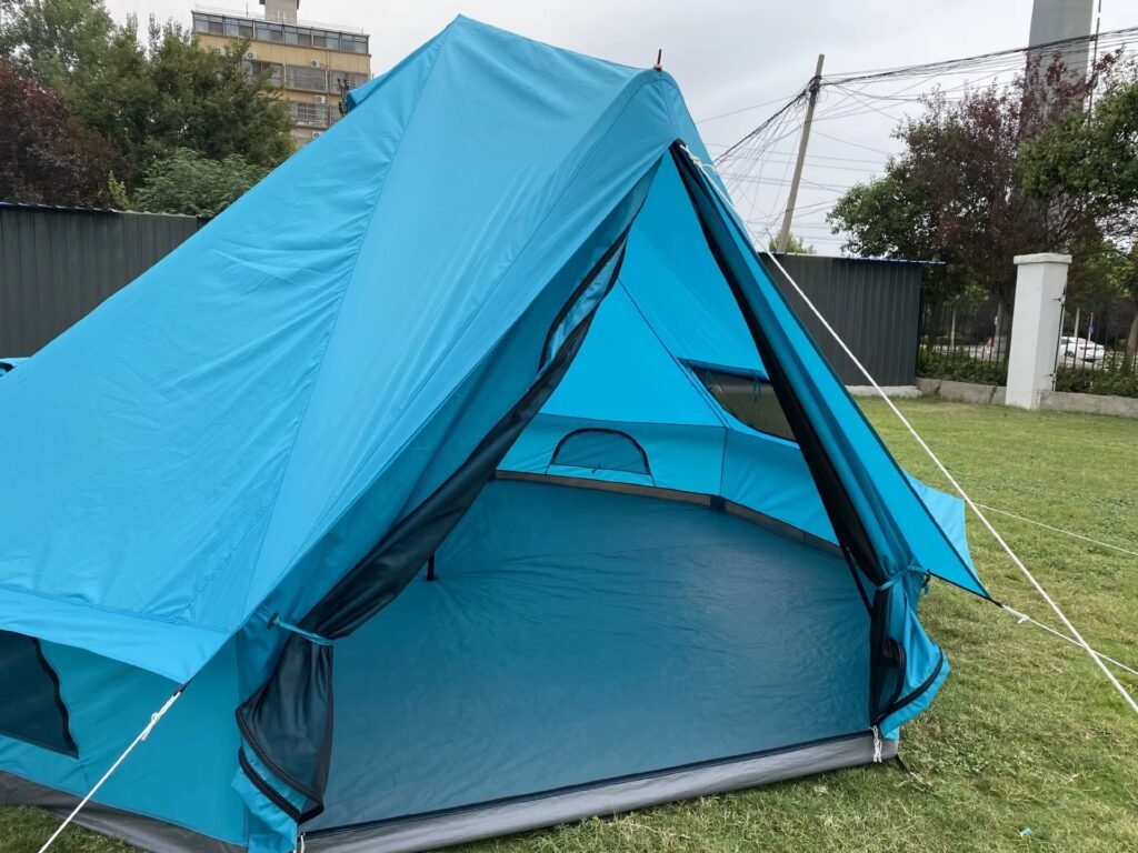 Blue camping tent interior with strong support frame and ventilation structure