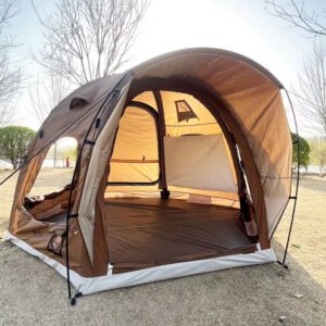 Open brown tent showing its interior in an outdoor setting