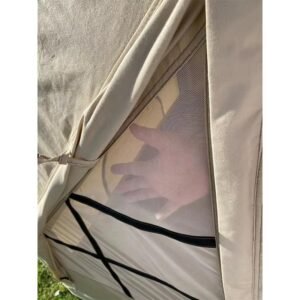Close-up of a mesh window panel on a khaki cabin tent.