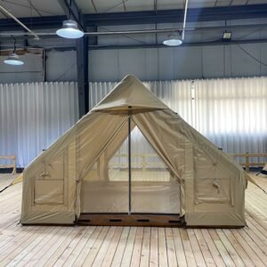 Front view of a beige inflatable tent with the mesh door open.