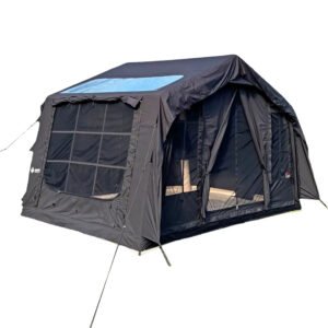 Dark inflatable tent with a roof window, mesh side panel, and open front on a white background