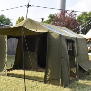 Olive green cabin camping tent with open front entrance, mesh panels, and extended awning on grass.
