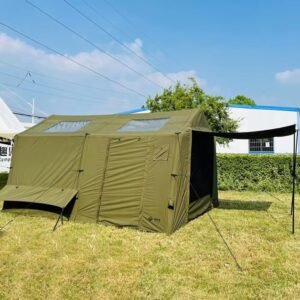 Olive green cabin tent with closed front entry panels, roof skylights, and a side awning.