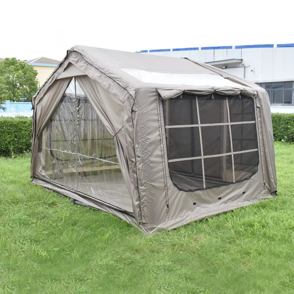 Side view of a gray-beige tent with a clear side panel and mesh window