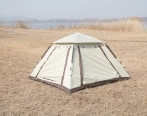 Pop-up camping tent shown closed with full rainfly coverage