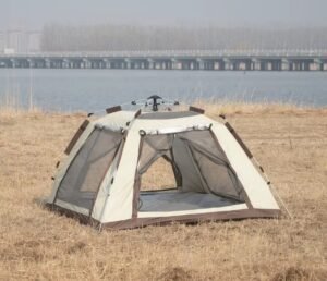 Waterproof pop-up camping tent with open front door and mesh windows