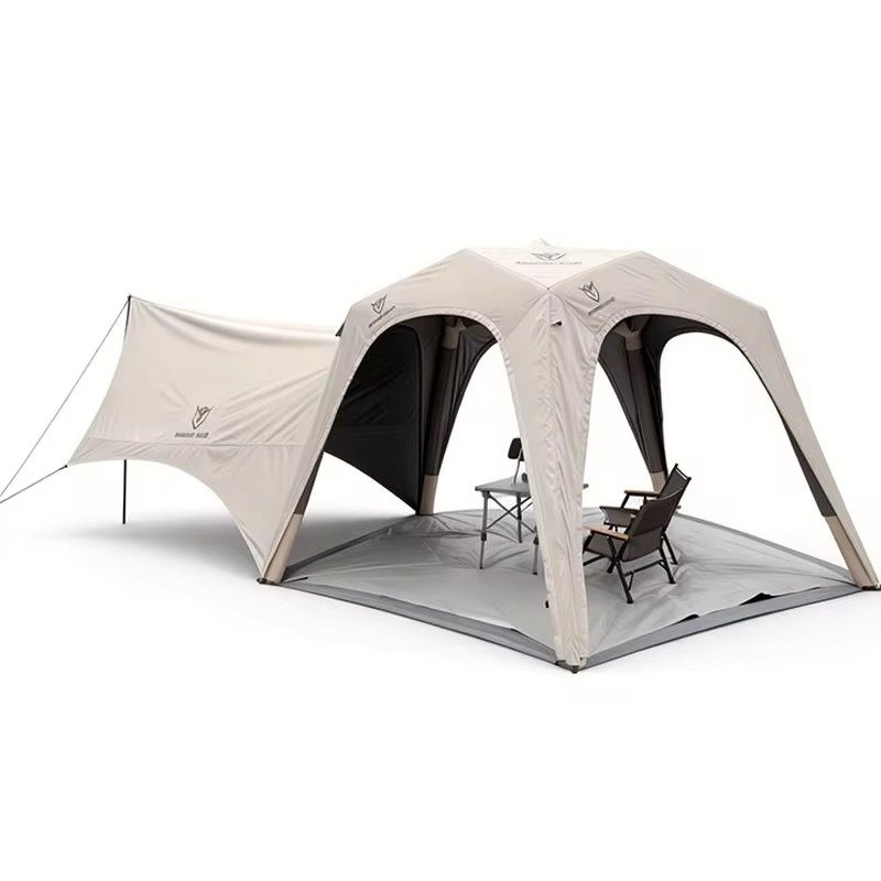 Light-colored inflatable outdoor tent with an extended side awning and groundsheet, shown against a white background.